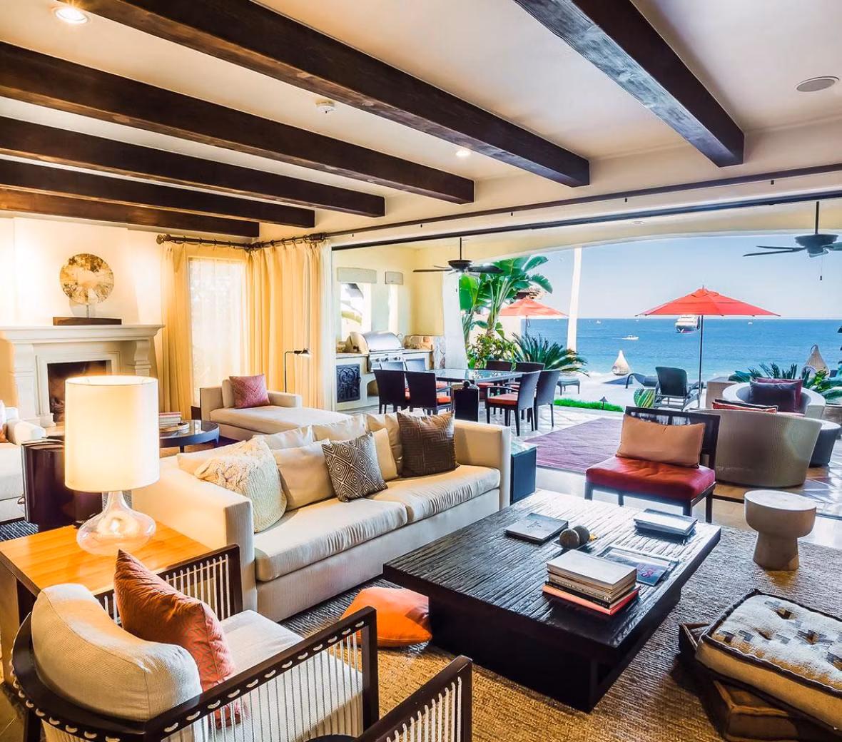 Sun loungers at a beachfront club along a calm turquoise bay, Hacienda Medano lifestyle, Cabo San Lucas
